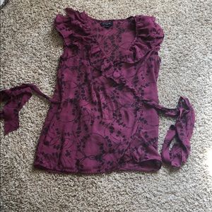 Purple floral wrap blouse with flutter sleeves